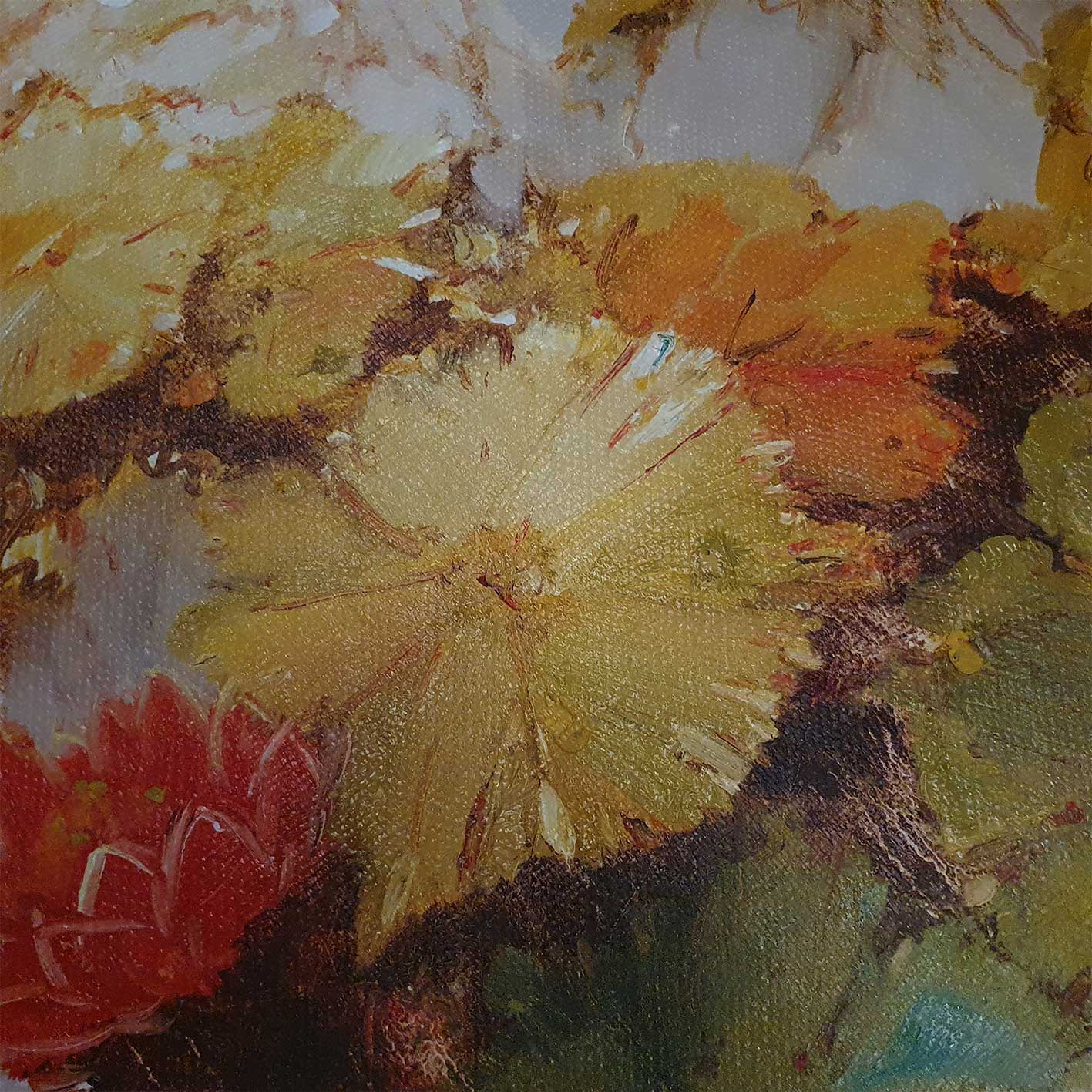 Detalle de textura de cuadro pintado a mano de nenúfares en tonos amarillos y naranjas