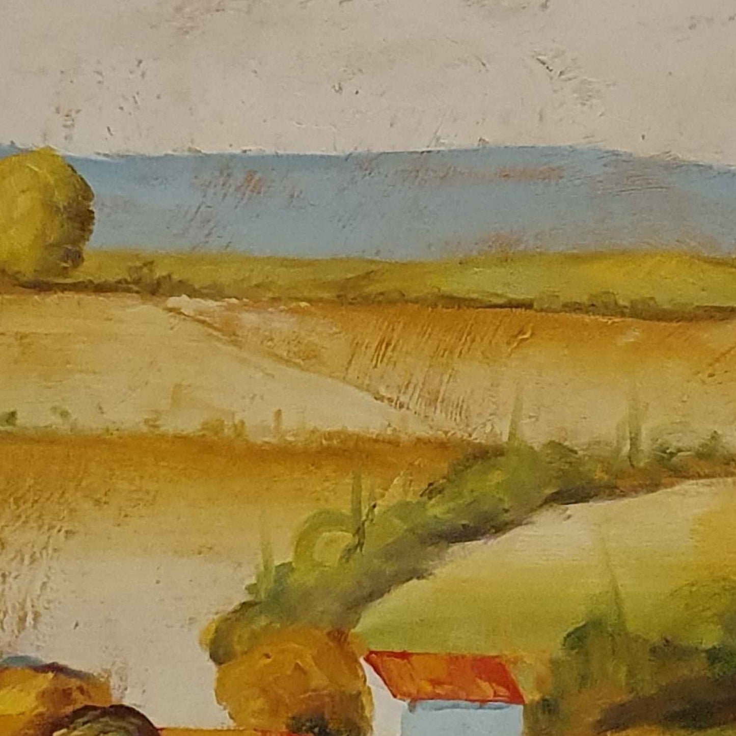 Paisaje rural con casas blancas y cipreses