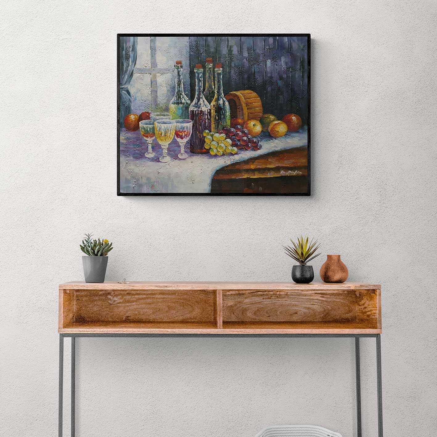 Cuadro decorativo con escena vinícola sobre mantel blanco