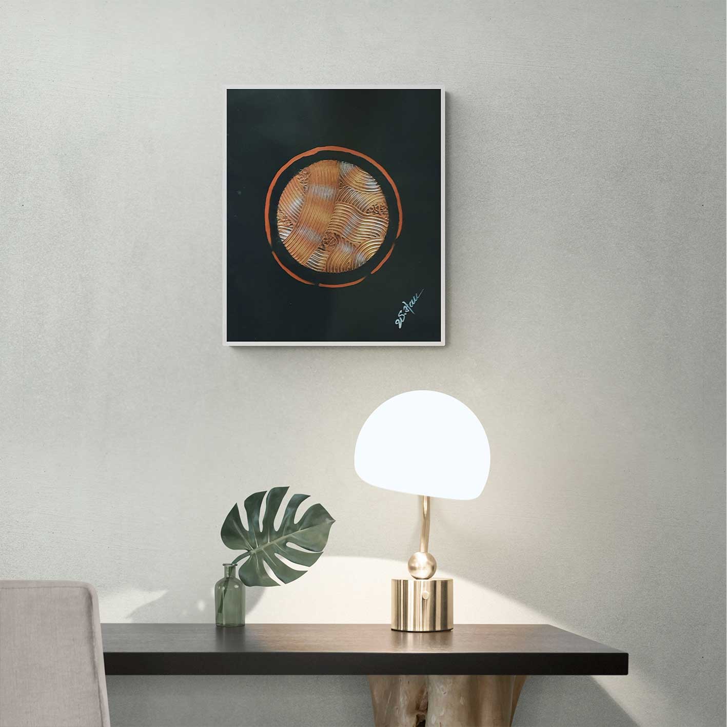 Lienzo redondo decorativo hecho a mano con detalles en cobre.